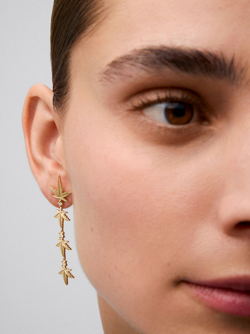18K yellow gold earrings with six brilliant-cut diamonds totaling 0.29 cts, in a maple leaf design image number 3