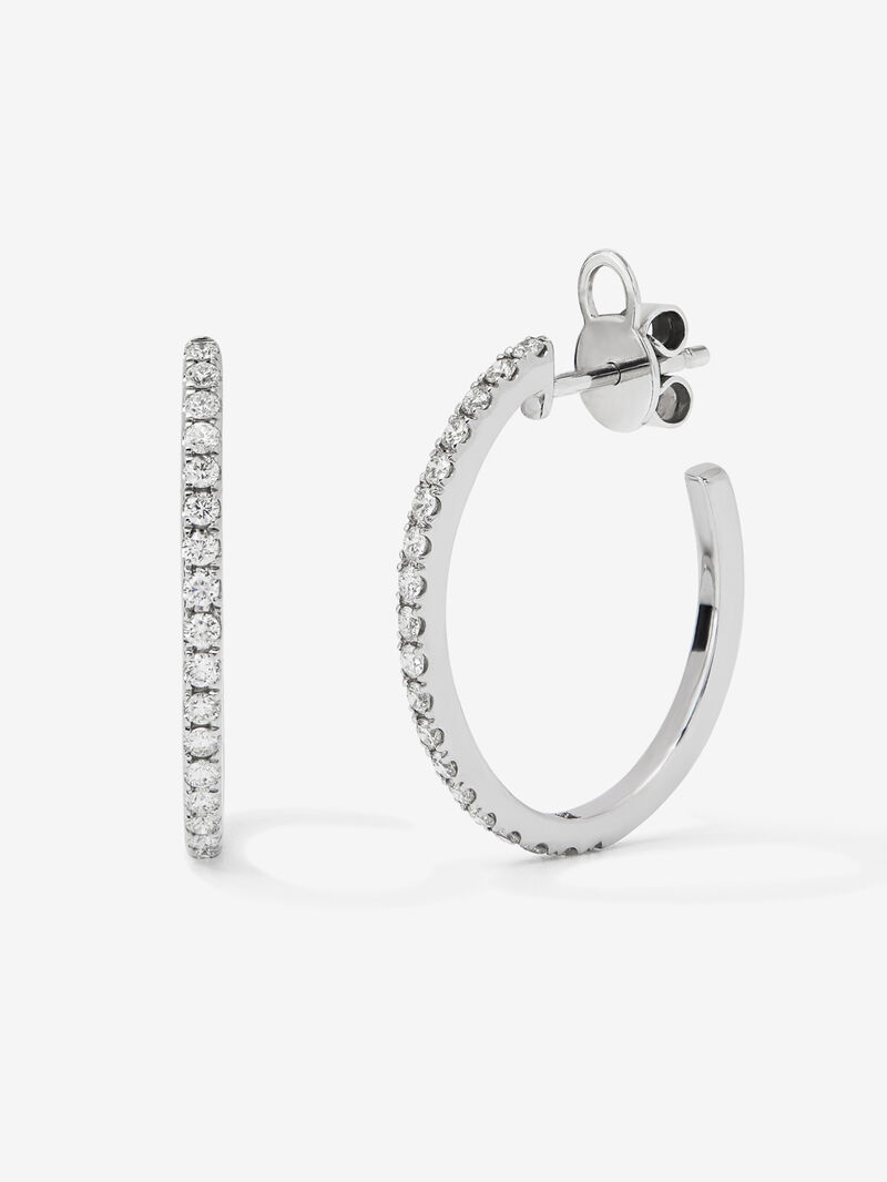 Thin hoop earrings made of 18K white gold with diamonds. image number 0