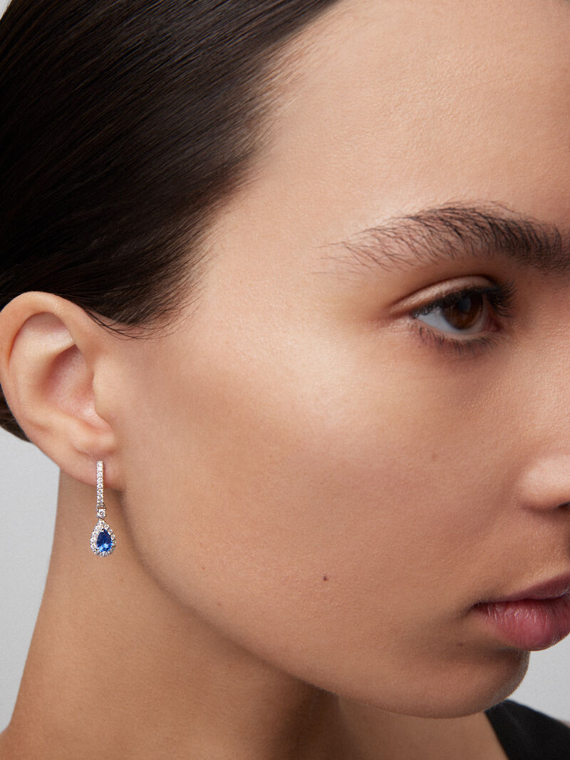 18K white gold earrings with 2 pear-cut blue sapphires with a total of 0.47 cts and 54 brilliant-cut diamonds with a total of 0.27 cts image number 1