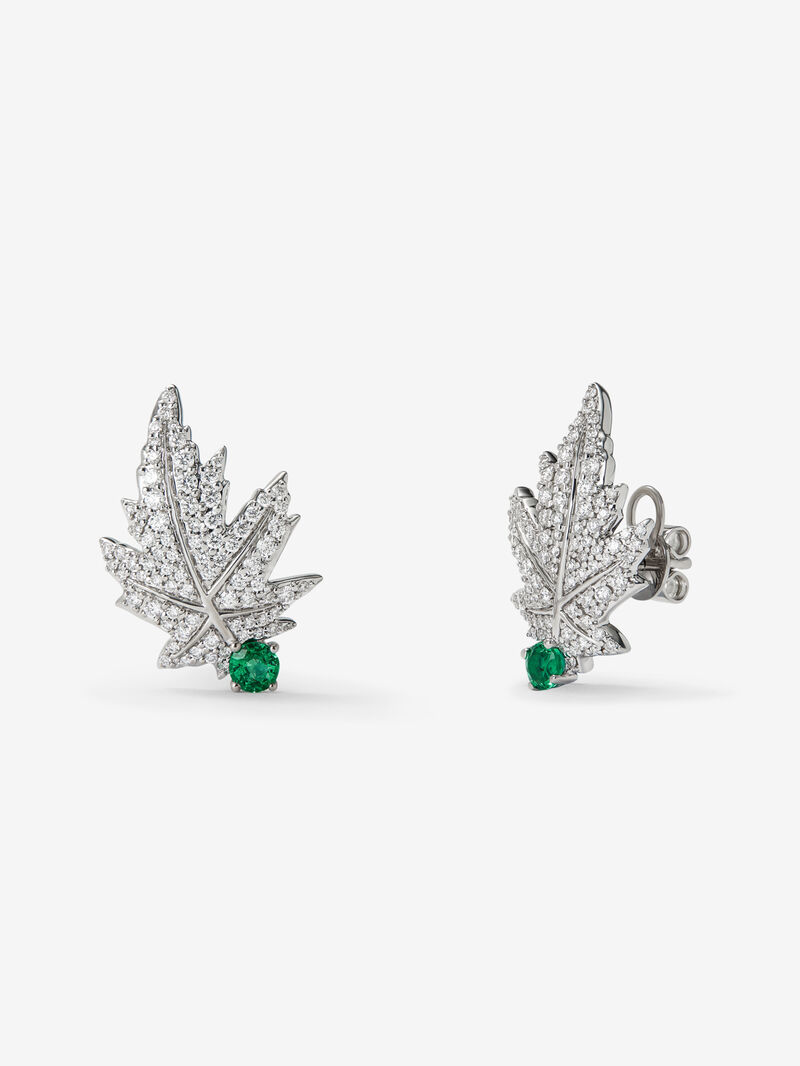 18K white gold earrings with two central emeralds totaling 0.28 cts, diamond pavé, and a maple leaf design image number 0