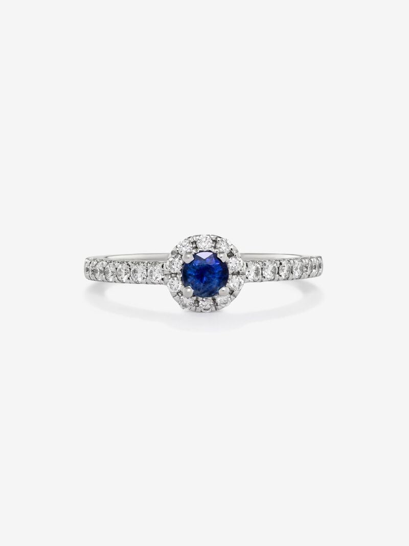 18K white gold ring with brilliant-cut blue sapphire of 0.4 cts and border and arm of 24 brilliant-cut diamonds with a total of 0.3 cts image number 1