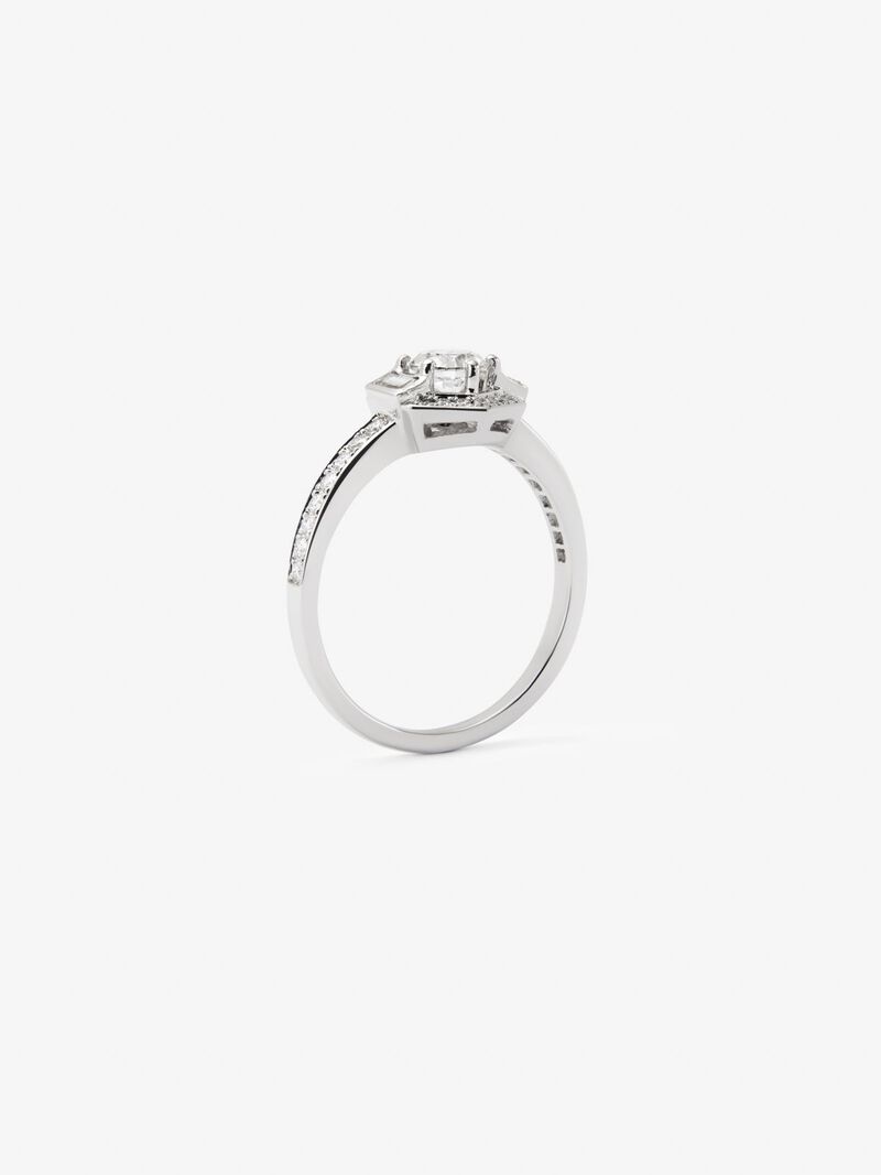 18K white gold ring with central brilliant-cut diamond of 0.4 cts and border with 2 baguette-cut diamonds with a total of 0.14 cts and 30 brilliant-cut diamonds with a total of 0.19 cts image number 4