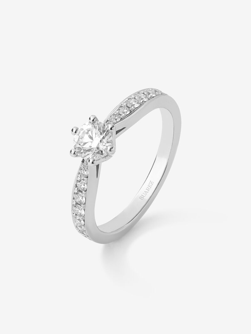 Solitaire ring in 18K white gold with a central 0.50-carat brilliant-cut diamond and additional diamonds totaling 0.25 cts image number 0