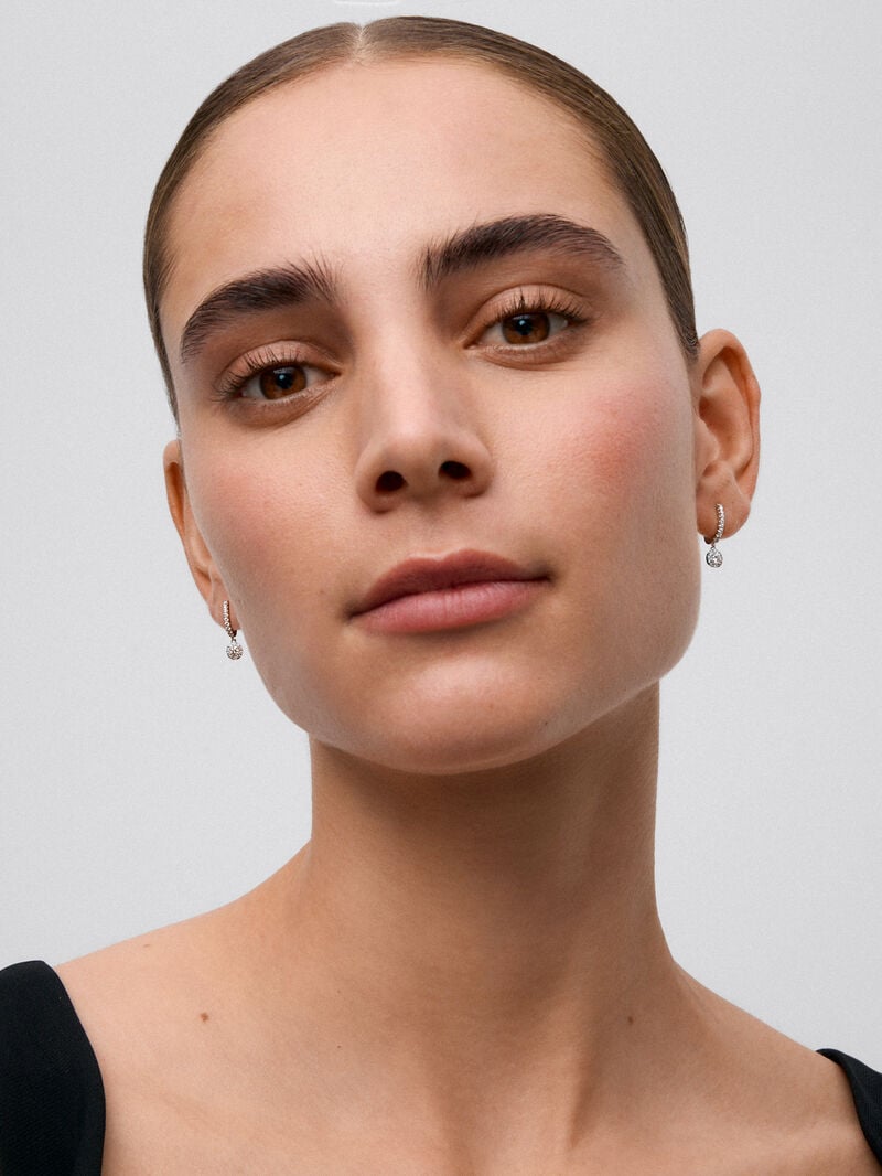 Hoop earrings with solitary pendant encircled by 18K white gold with diamonds image number 0