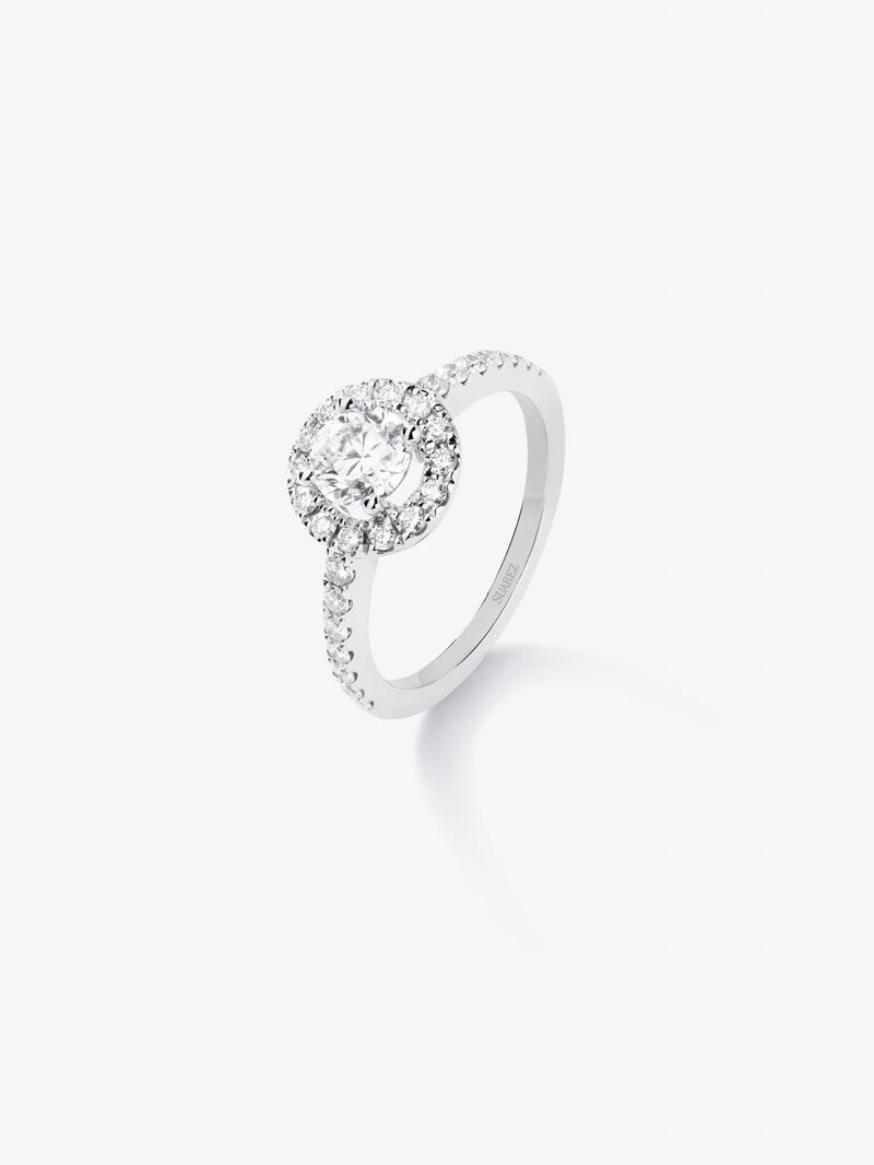 18K white gold ring with central brilliant-cut diamond of 0.7 cts and border and arm with 28 brilliant-cut diamonds with a total of 0.44 cts image number 0