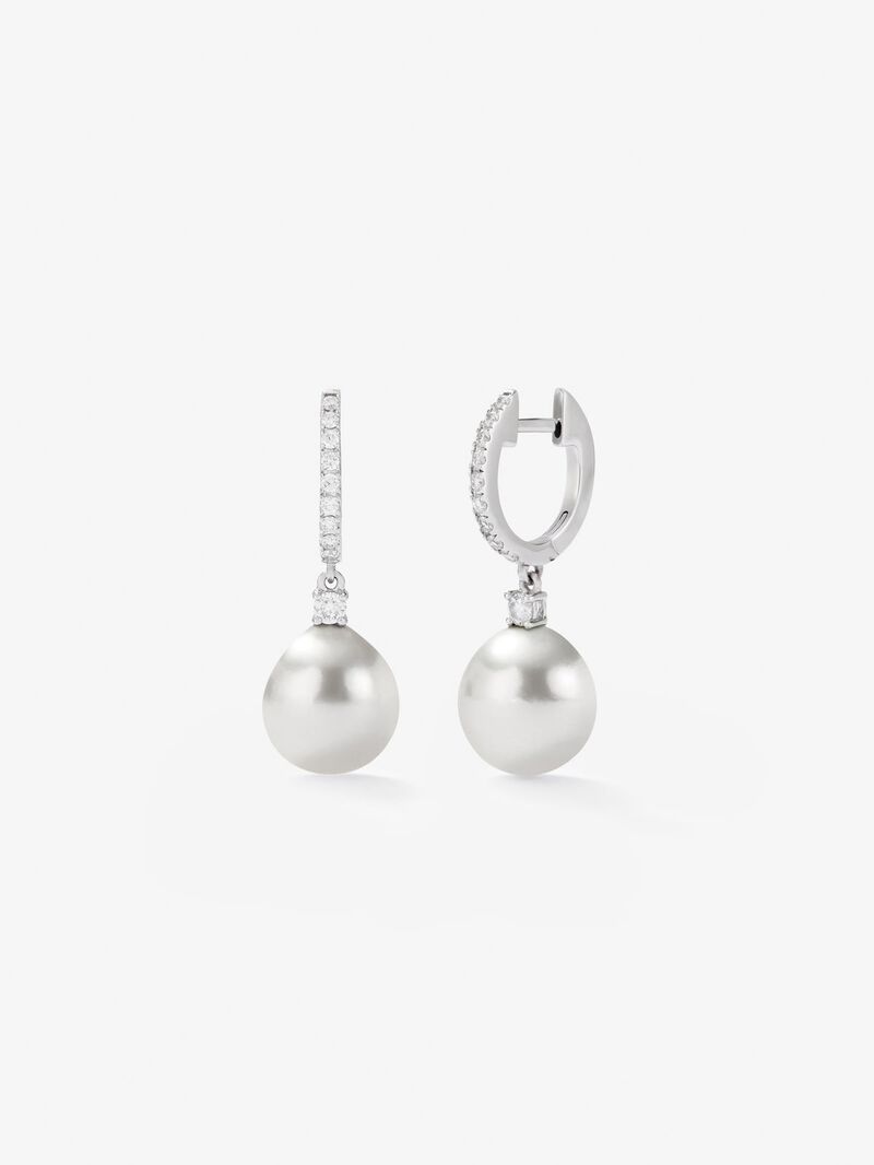 18K white gold earrings with 9 mm Australian pearls and diamonds in bright 0.31 cts image number 1