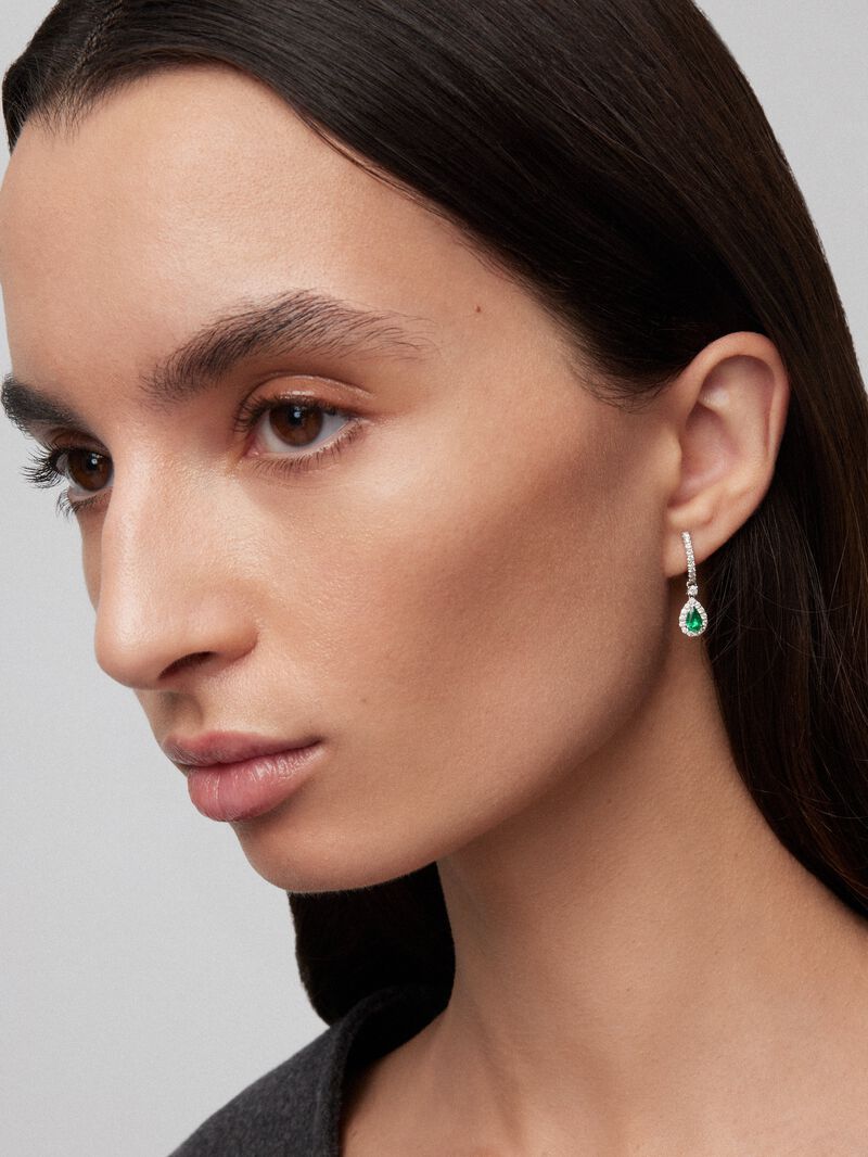 18K white gold earrings with 2 pear-cut green emeralds with a total of 0.7 cts and 48 brilliant-cut diamonds with a total of 0.53 cts image number 1