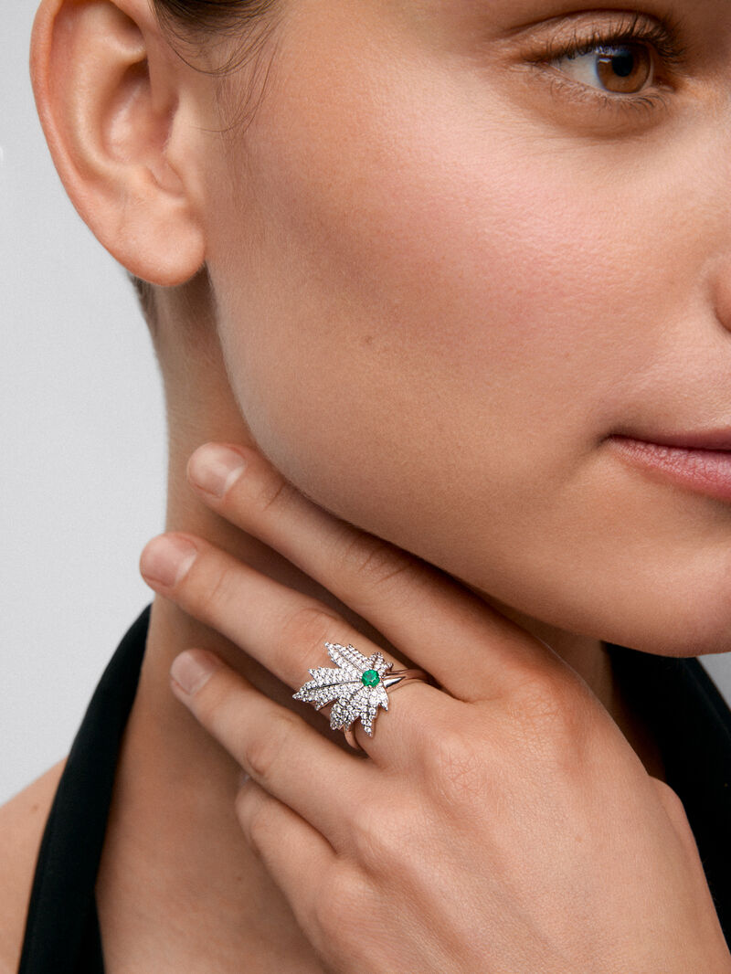 18K white gold ring with a 0.16 ct central emerald, diamond pavé, and a maple leaf design image number 1