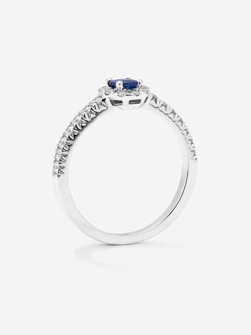 18K white gold ring with brilliant-cut blue sapphire of 0.4 cts and border and arm of 24 brilliant-cut diamonds with a total of 0.3 cts image number 2