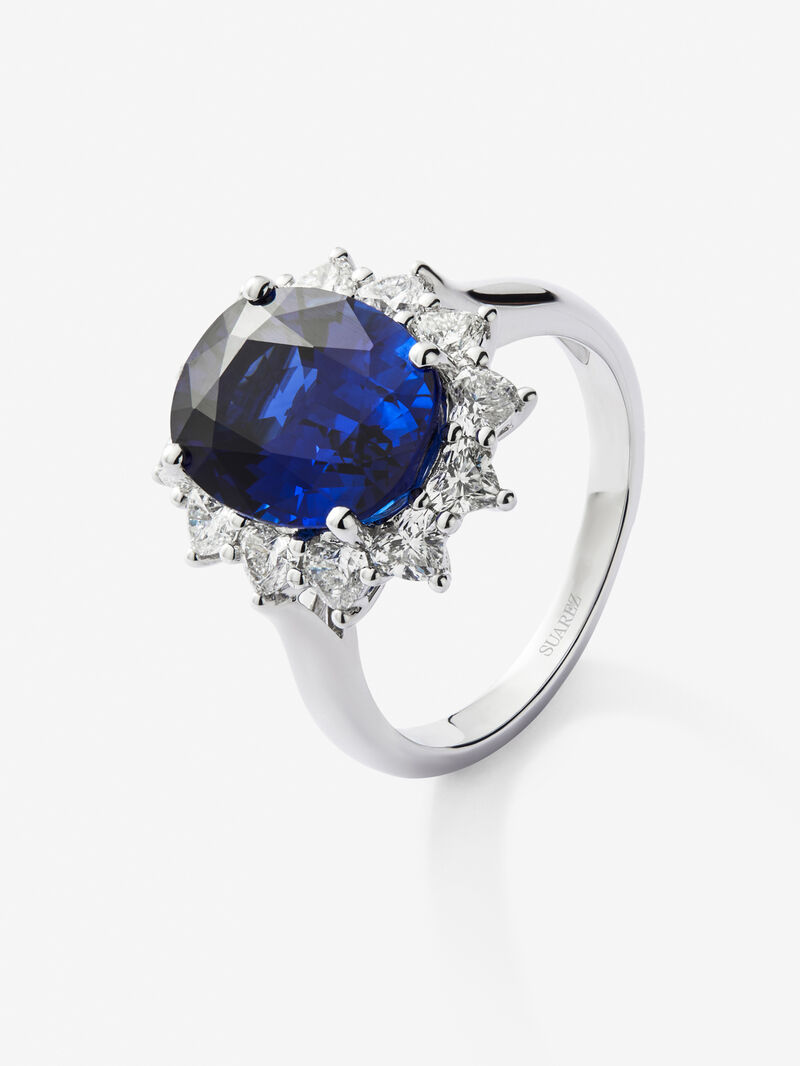 18K white gold ring with vivid blue sapphire in oval cut of 5.01 cts and 10 heart-cut diamonds with a total of 1.06 cts image number 0