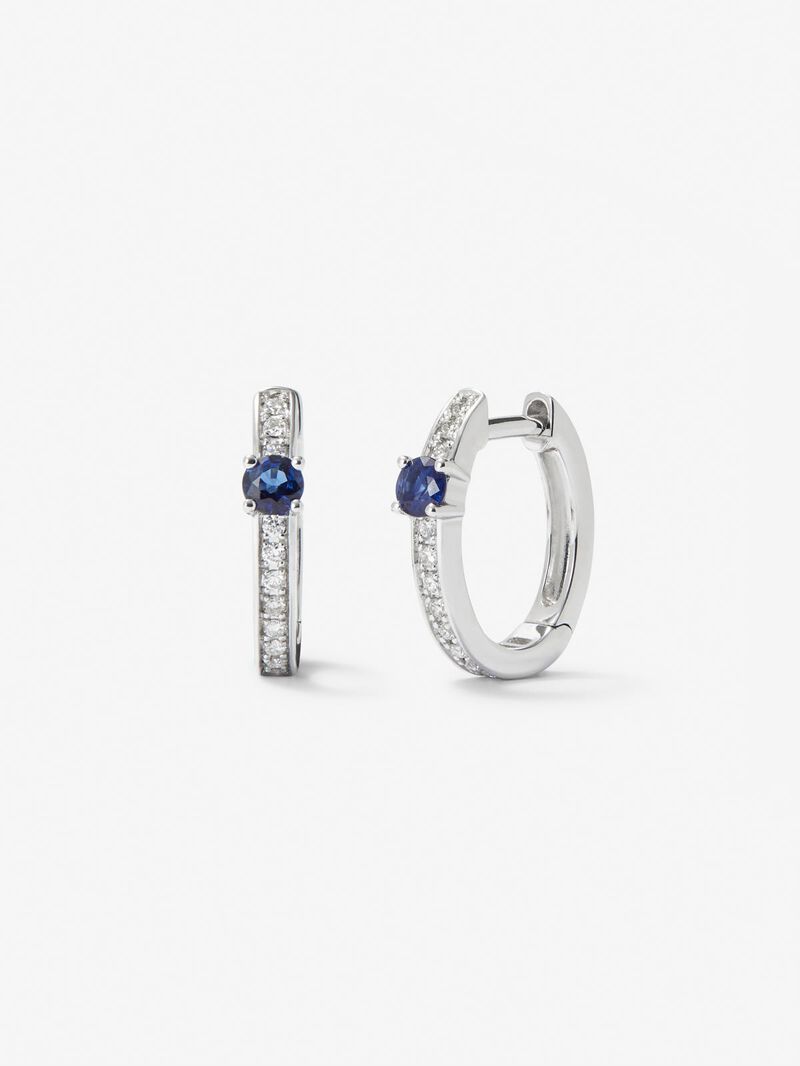 18K white gold hoop earrings with 2 brilliant-cut blue sapphires with a total of 0.15 cts and 26 brilliant-cut diamonds with a total of 0.1 cts image number 0