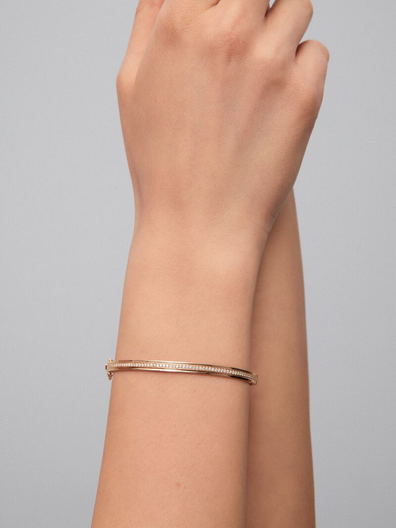 Rigid 18K yellow gold bracelet with 64 brilliant-cut diamonds with a total of 0.38 cts image number 1