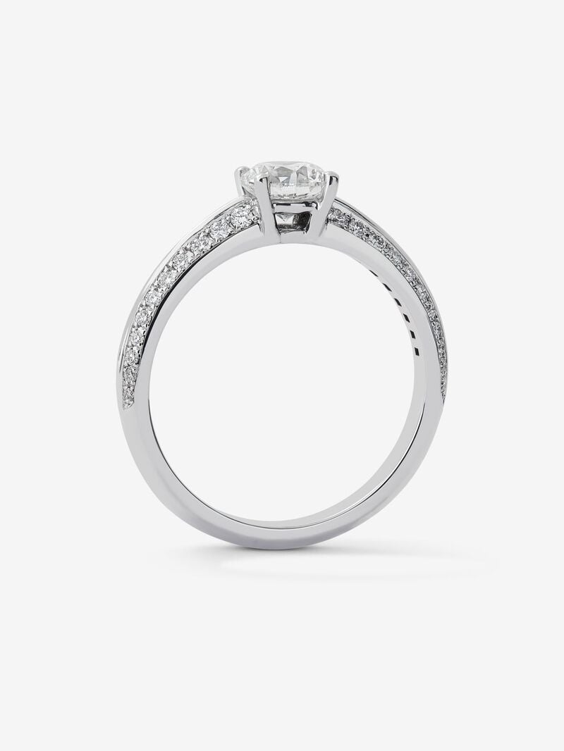 Solitaire ring in 18K white gold with a 0.70-carat central diamond and additional brilliant-cut diamonds totaling 0.25 cts image number 4