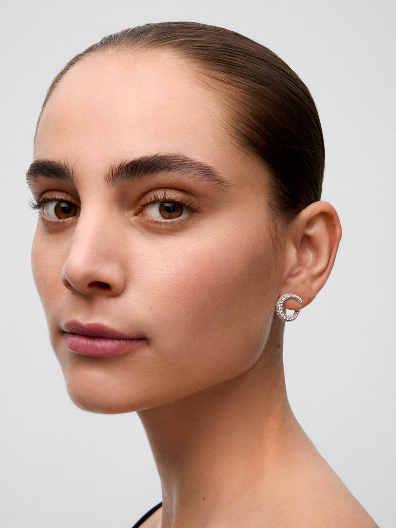 Small open 18K white open ring earrings with diamond paw image number 3