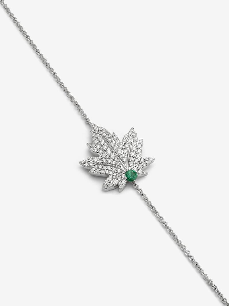 18K white gold bracelet with a 0.1 ct central emerald, diamond pavé, and a maple leaf design image number 1