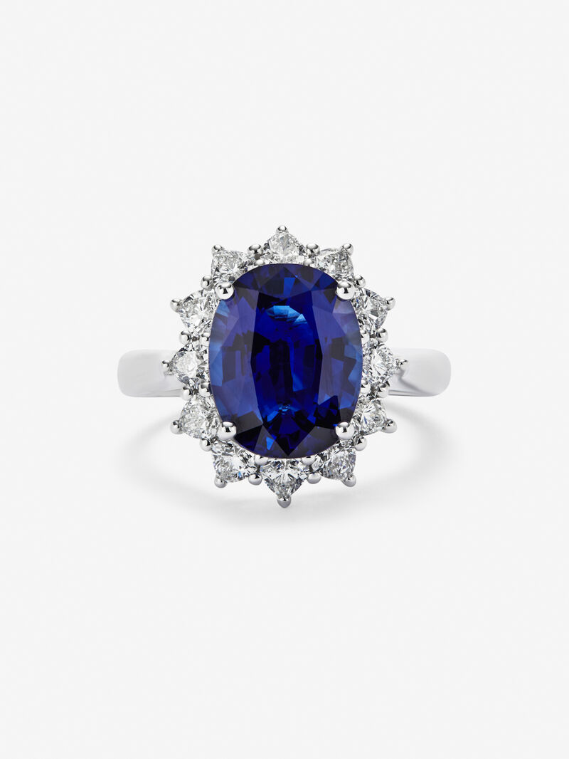 18K white gold ring with vivid blue sapphire in oval cut of 5.01 cts and 10 heart-cut diamonds with a total of 1.06 cts image number 2