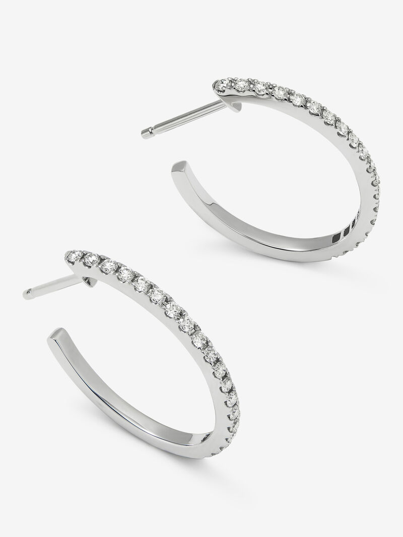 Thin hoop earrings made of 18K white gold with diamonds. image number 2