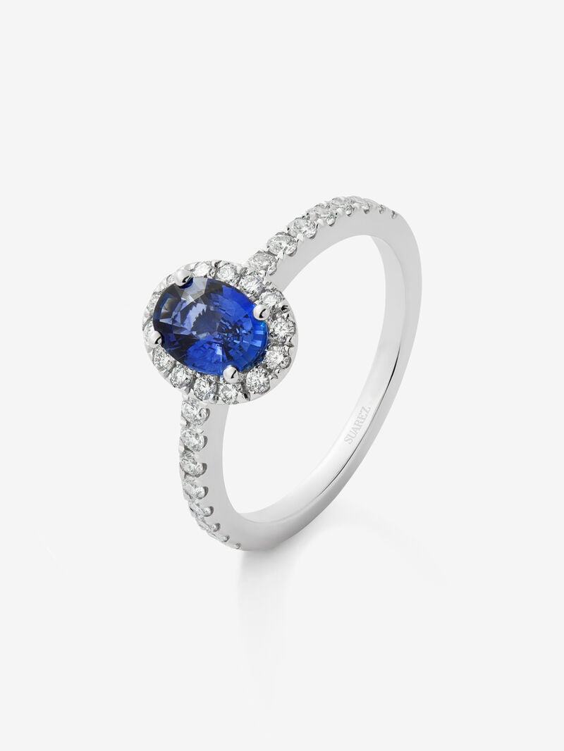 18K white gold ring with a 0.91 ct oval-cut blue sapphire and a brilliant-cut diamond border with a total of 0.37 cts image number 0