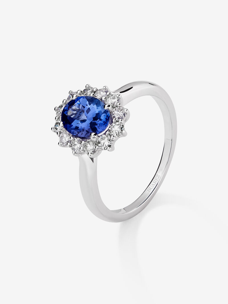 18K white gold ring with tanzanita in oval size 1.24 cts and white diamonds in bright size image number 0