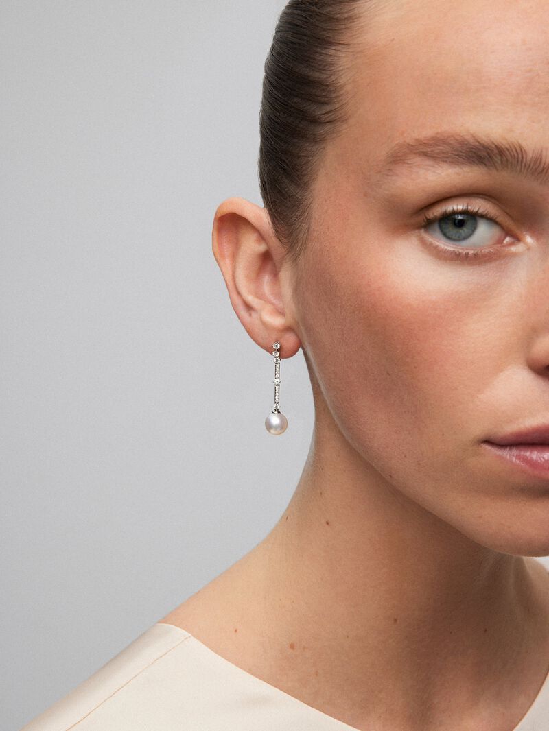 18k white gold pendant earring with Australian pearl and diamond. image number 1