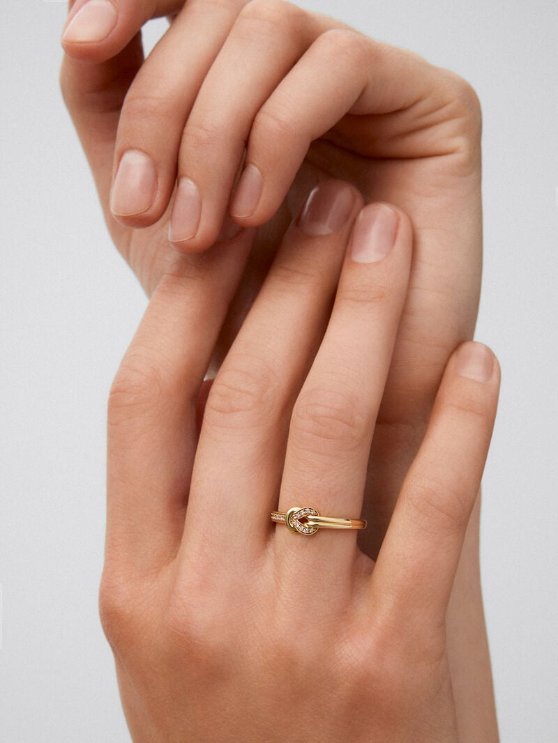 18K yellow gold ring with 15 brilliant-cut diamonds with a total of 0.09 cts and a knot shape image number 3