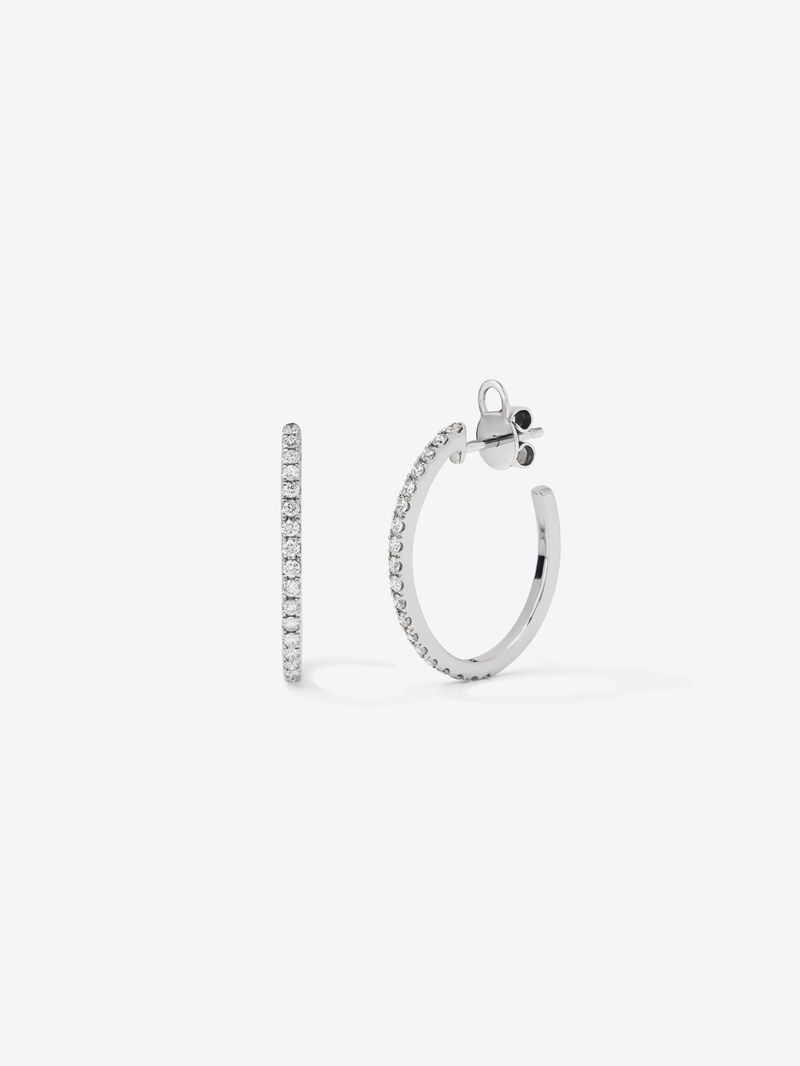 Thin hoop earrings made of 18K white gold with diamonds. image number 0