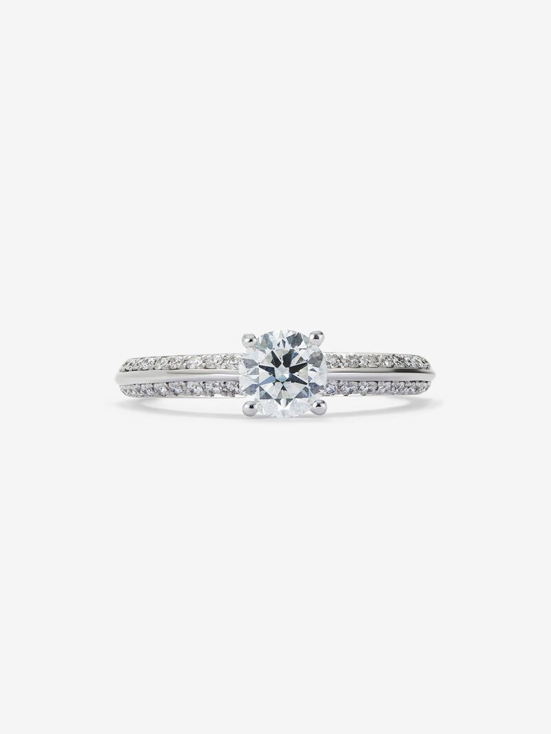 Solitaire ring in 18K white gold with a 0.70-carat central diamond and additional brilliant-cut diamonds totaling 0.25 cts image number 2