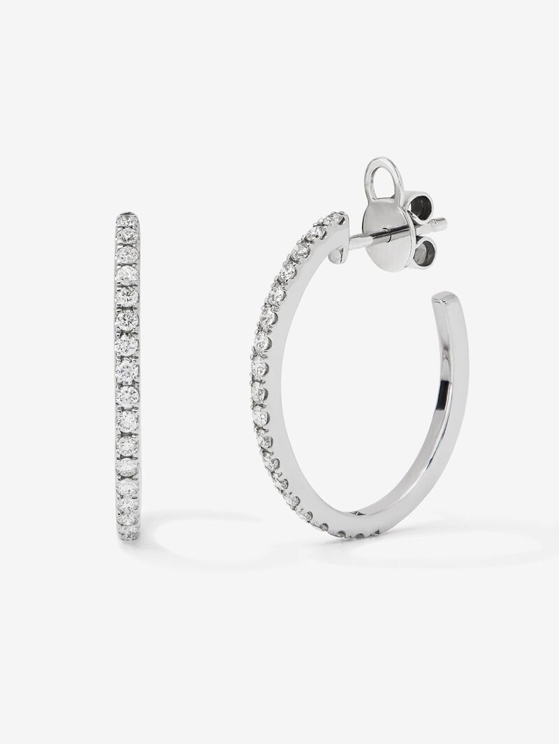 Thin hoop earrings made of 18K white gold with diamonds. image number 0