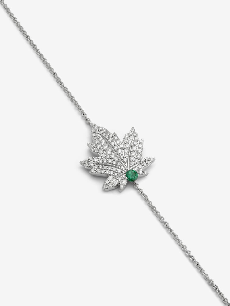 18K white gold bracelet with a 0.1 ct central emerald, diamond pavé, and a maple leaf design image number 1