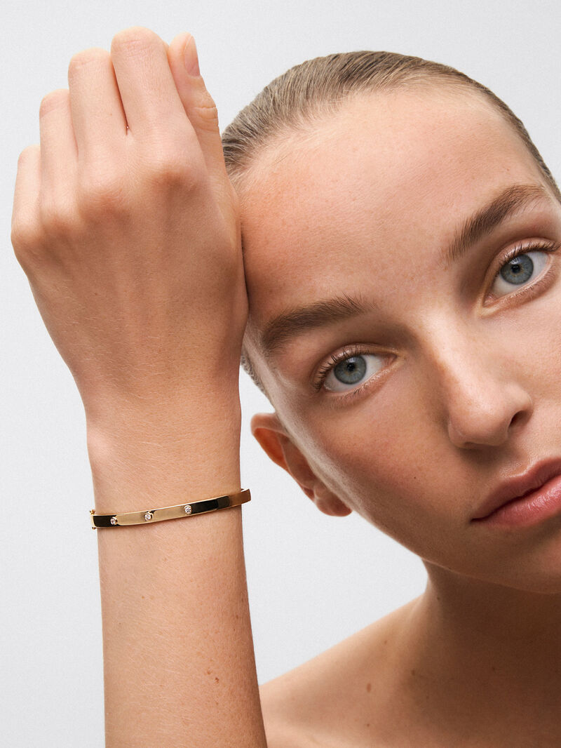 Rigid 18K yellow gold bracelet with white diamonds in 0.13 cts image number 3