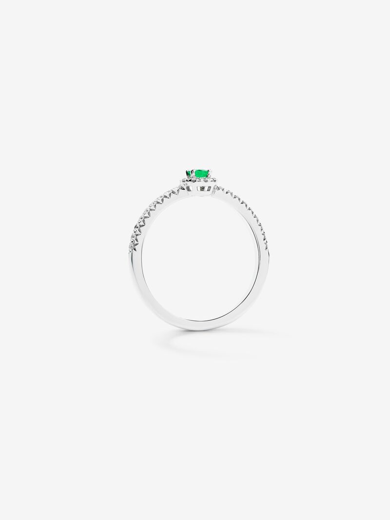18K white gold ring with brilliant-cut emerald of 0.21 cts and arm and border of 24 brilliant-cut diamonds with a total of 0.29 cts image number 2
