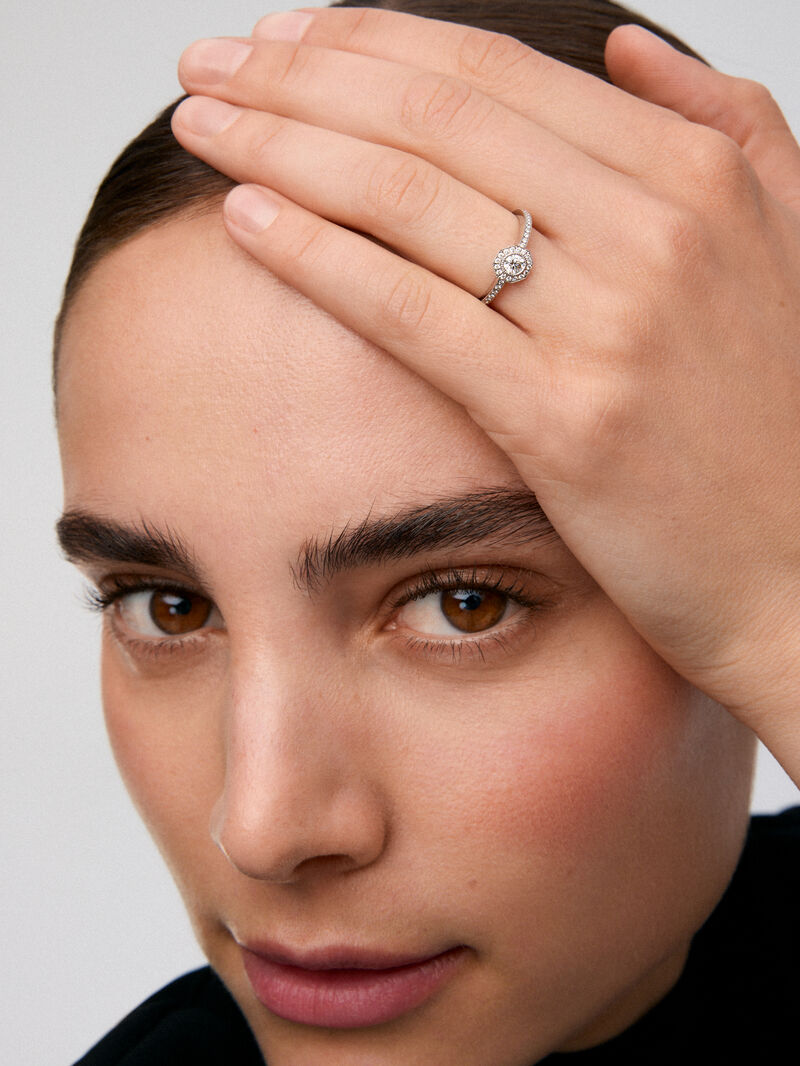 18K white gold solitaire engagement ring with a diamond halo image number 3