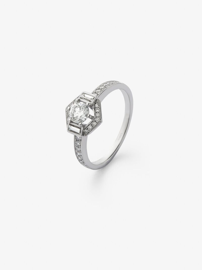 18K white gold ring with central brilliant-cut diamond of 0.4 cts and border with 2 baguette-cut diamonds with a total of 0.14 cts and 30 brilliant-cut diamonds with a total of 0.19 cts image number 0