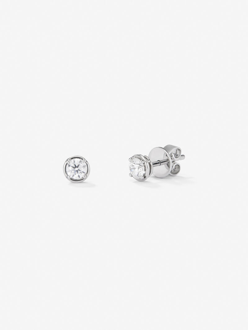 18K white gold earrings with single diamond image number 0