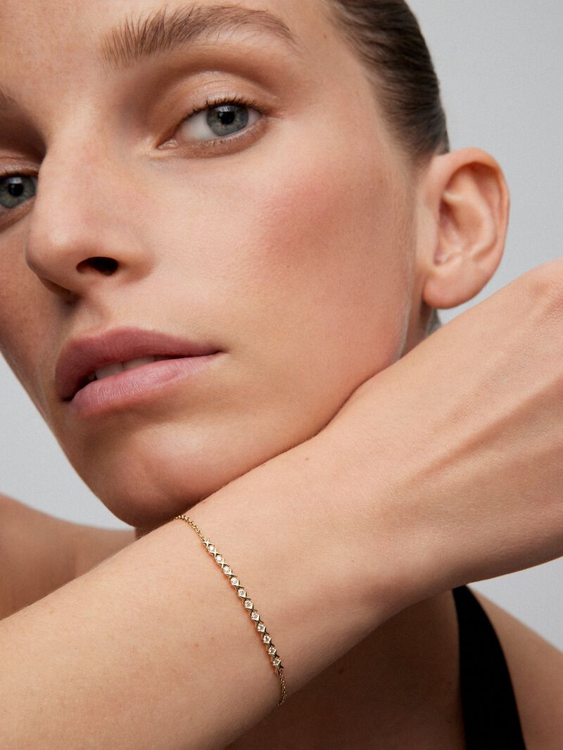 18K yellow gold bracelet with 11 brilliant-cut diamonds with a total of 0.16 cts image number 1