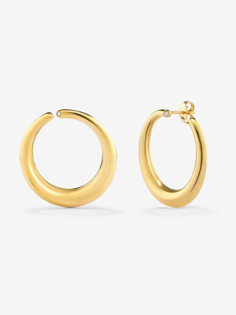 Large smooth hoop earrings in 18K yellow gold with diamond. image number 0
