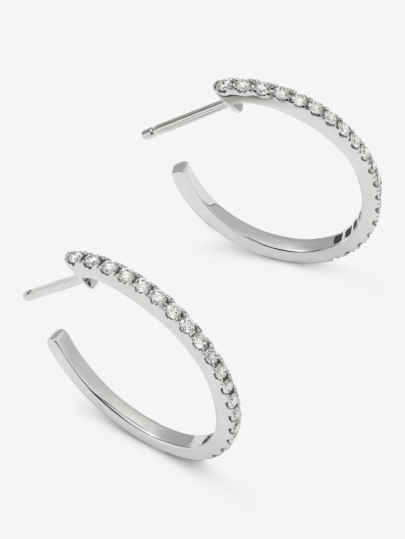 Thin hoop earrings made of 18K white gold with diamonds. image number 2
