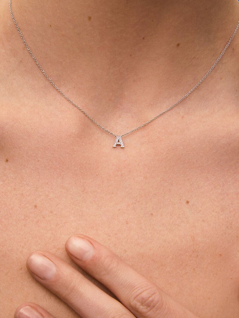 Pendant necklace with small initial in 18K white gold and diamonds. image number 2