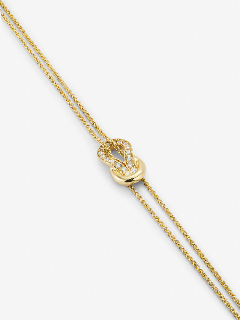 18K yellow gold bracelet with white diamonds of 0.15 cts and knot shape image number 2