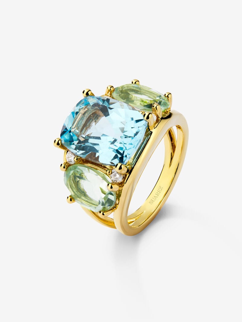 18K yellow gold ring with blue Sky Topacio in 5.5 cts Cushion size, green -sized icatists of 4.65 cts and white diamonds in a brilliant size of 0.15 cts image number 0