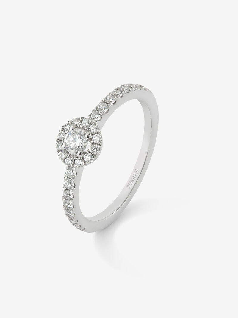 18K white gold ring with central brilliant-cut diamond of 0.15 cts and border and arm of 28 brilliant-cut diamonds with a total of 0.3 cts image number 0