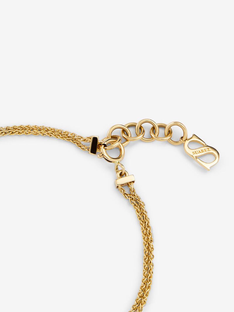 18K yellow gold bracelet with 17 brilliant-cut diamonds with a total of 0.15 cts and a knot shape image number 4