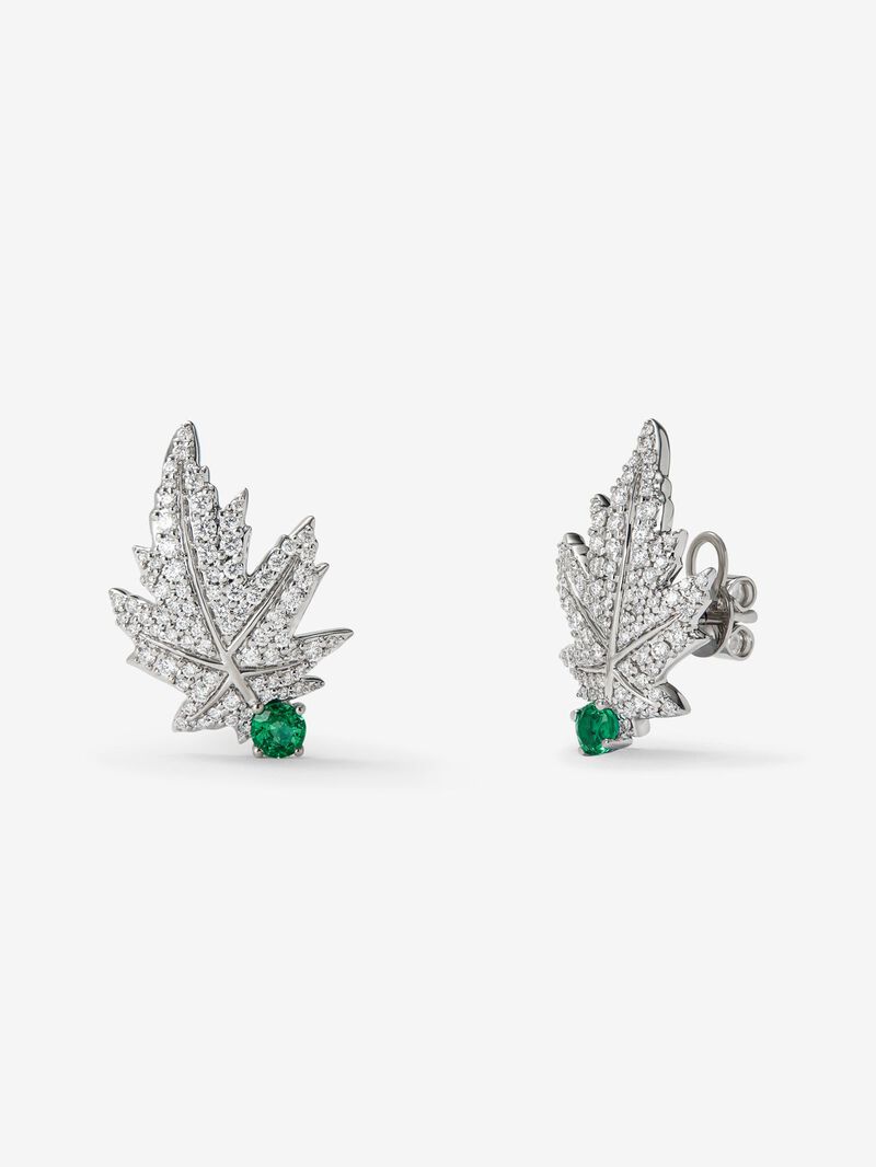 18K white gold earrings with two central emeralds totaling 0.28 cts, diamond pavé, and a maple leaf design image number 0