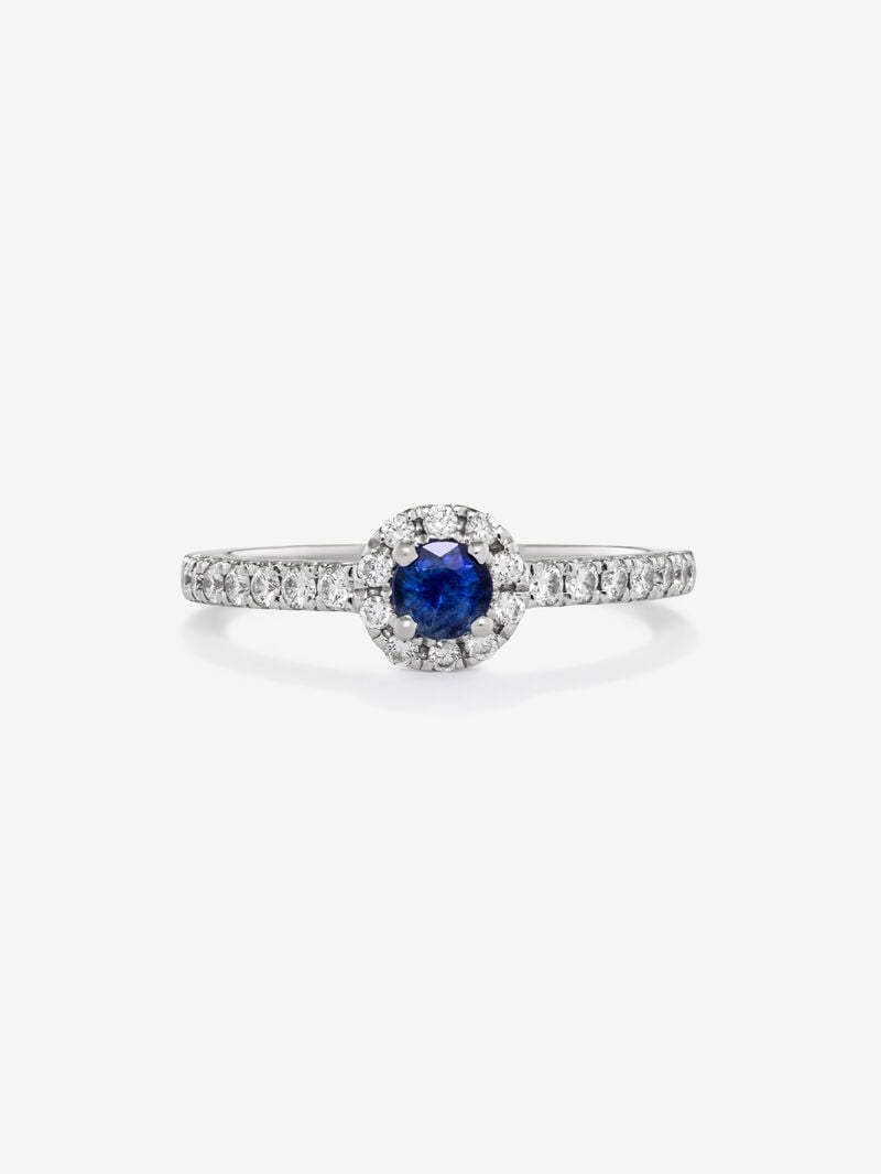 18K white gold ring with brilliant-cut blue sapphire of 0.4 cts and border and arm of 24 brilliant-cut diamonds with a total of 0.3 cts image number 1