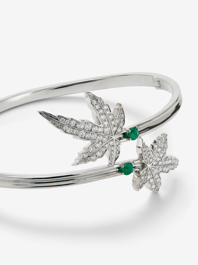18K white gold bracelet with two central emeralds totaling 0.24 cts, diamond pavé, and a maple leaf design. image number 2