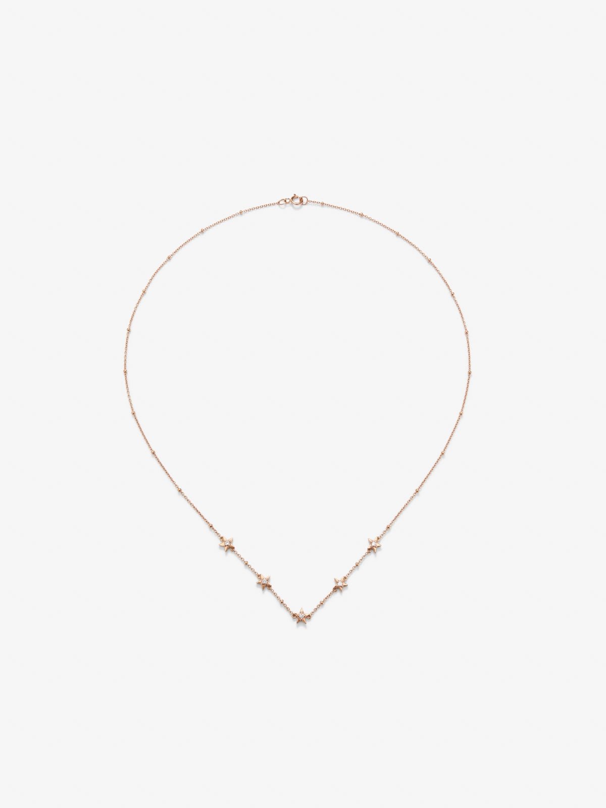 18kt Rose gold star pendant with diamonds