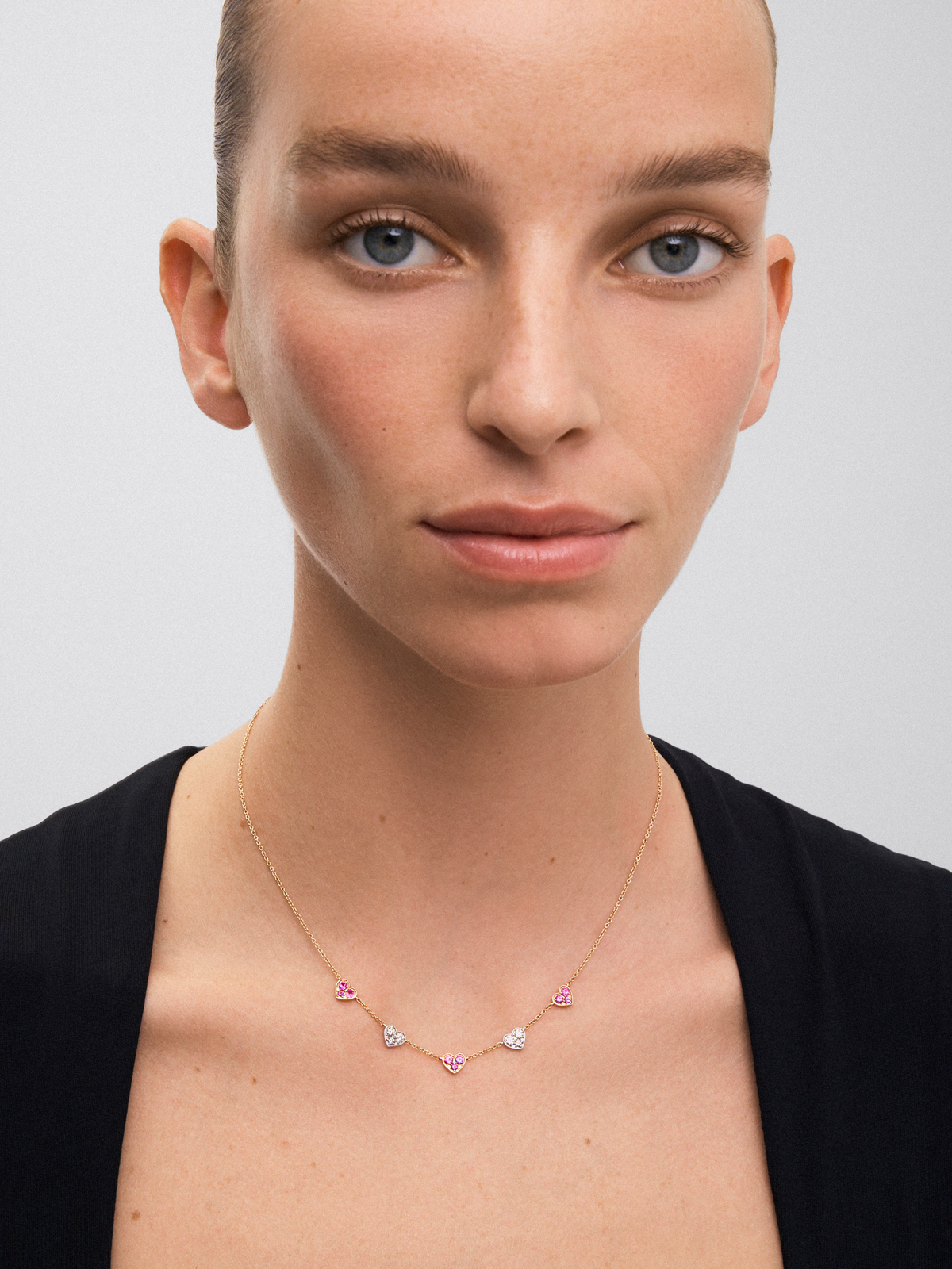 18kt Rose Gold and White Gold Heart Necklace with Pink Sapphires and Diamonds.