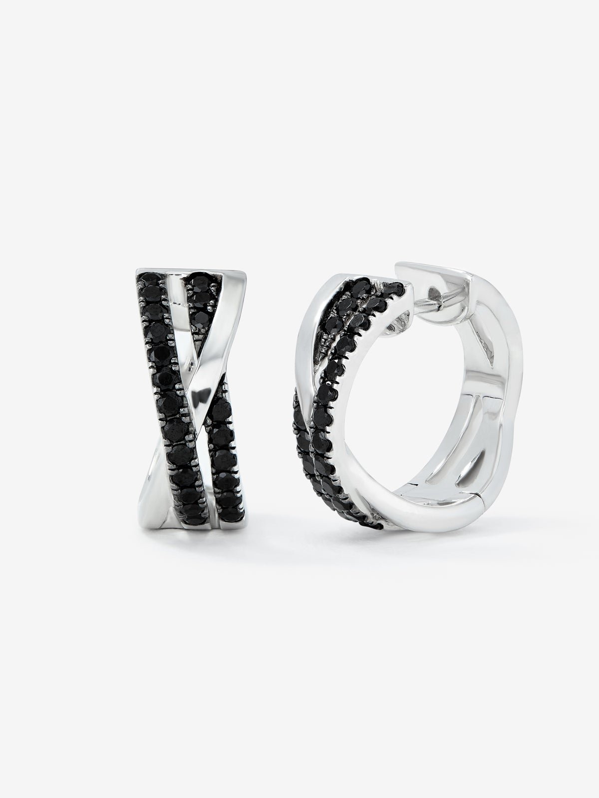 Double crossed hoop earrings made of 925 silver with spinels.
