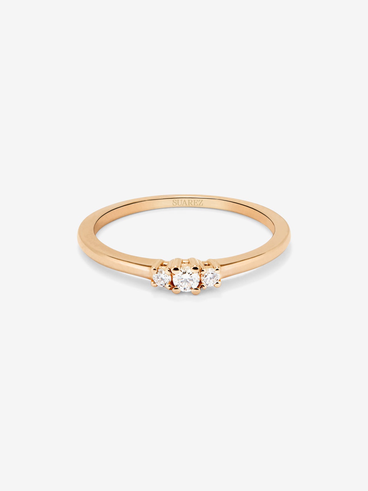 Anillo de oro rosa de 18K con 3 diamantes en talla brillante con un total de 0,11 cts