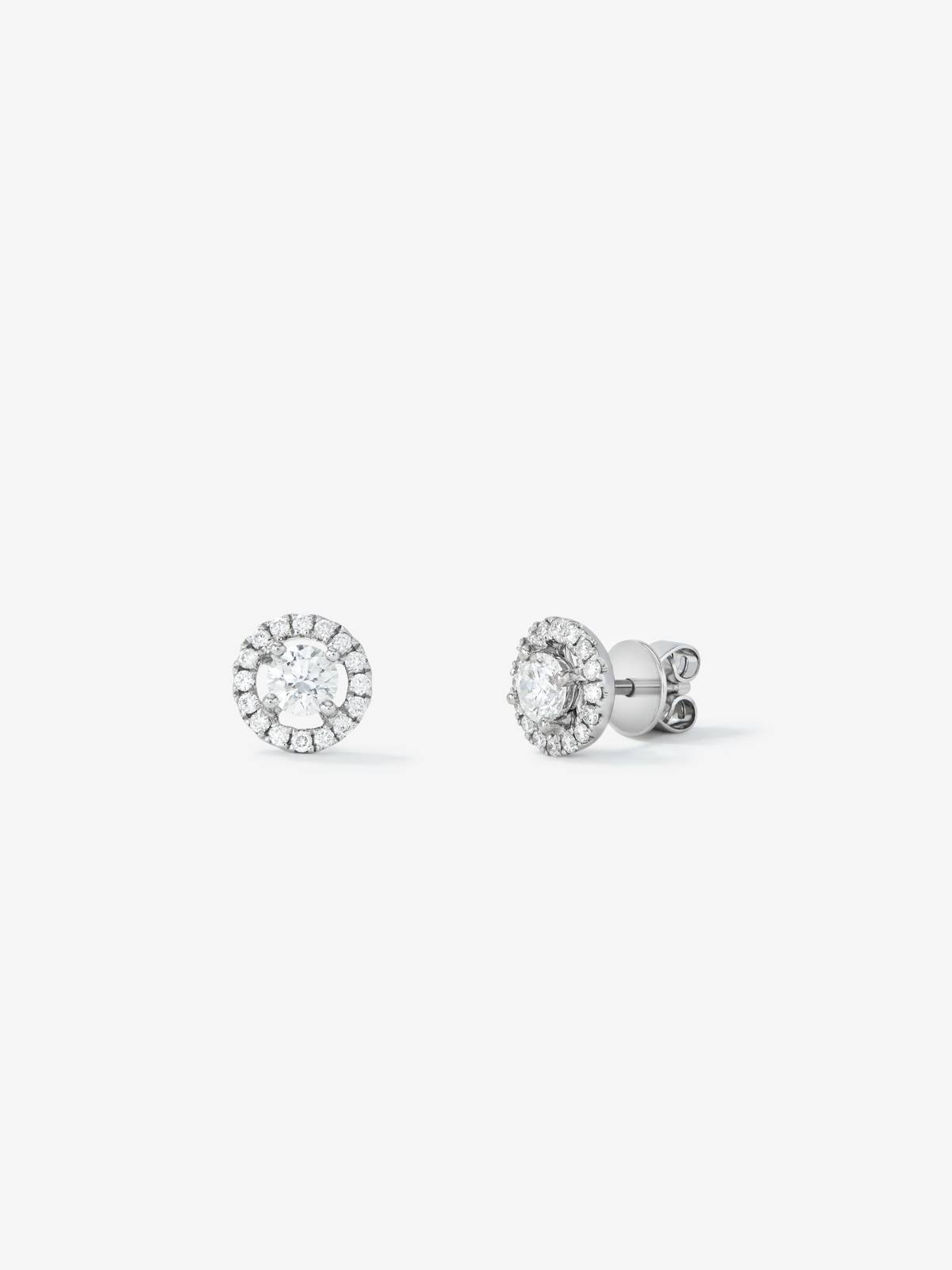 18K white gold earrings with solitaire diamond and diamond halo.